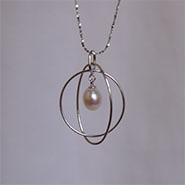 geo circular-oval sterling silver pendant.