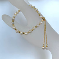 5.5-6mm cultured white pearls with adjustable sterling silver chain bracelet - yellow